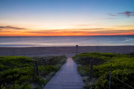 Sunrise beach ocean photo