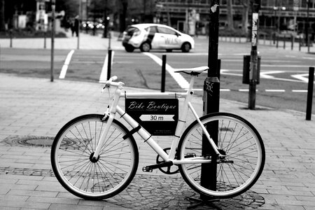 Black and white cyclists ad photo