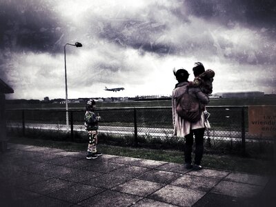 Mother children plane photo