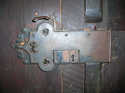 Antique metal castle key hole photo