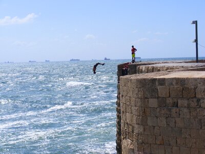 Pier jumping water