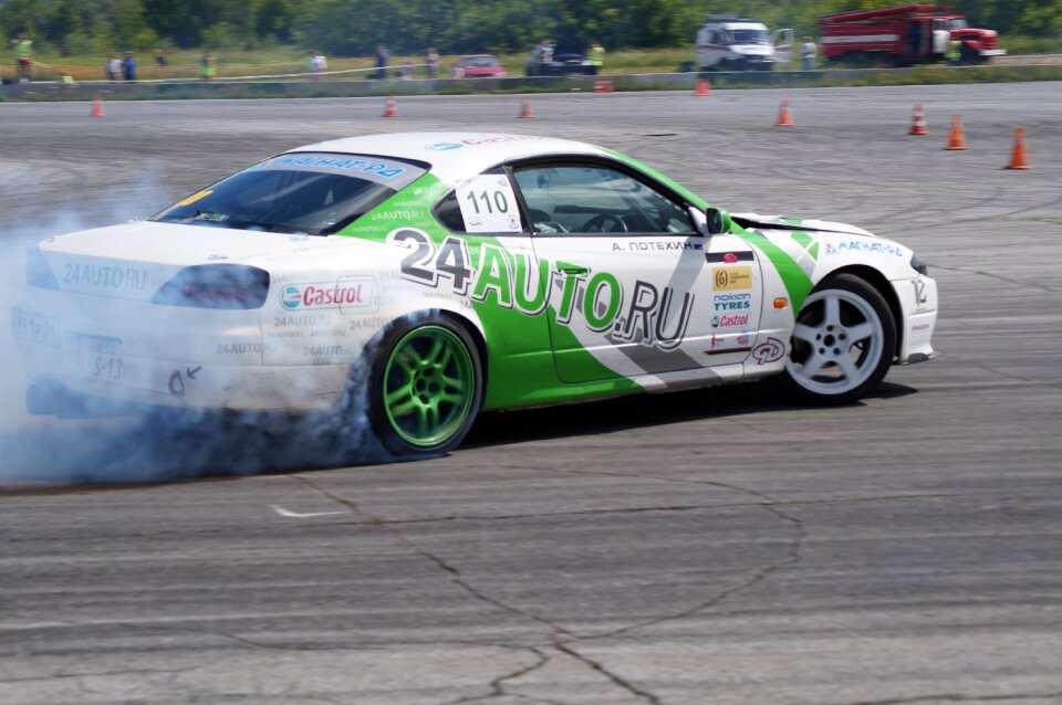 Nissan silvia drift competition smoke from under the wheels