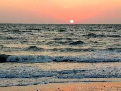 Beach shore sunset photo