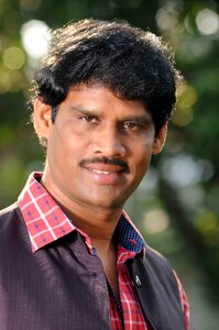 Masculin chairman film producer