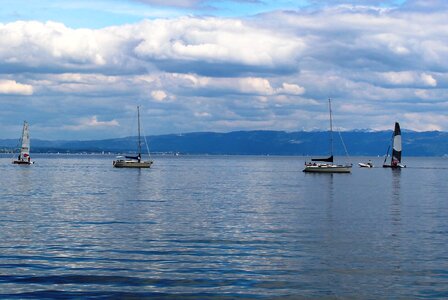 Water sailing boats clouds photo