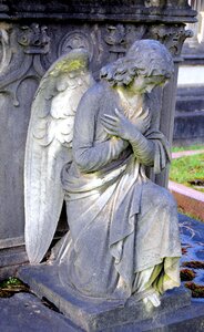 Tombstone grave sculpture