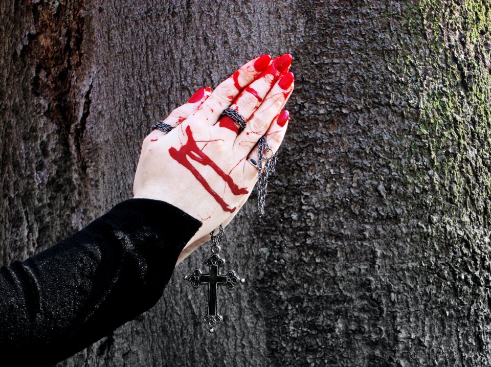 Pray blood female hands