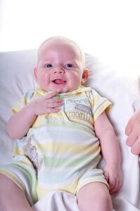 Smiling suckling infant
