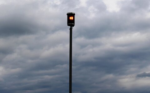 Flash light lake constance clouds heavy sky