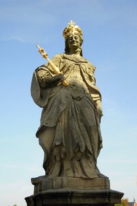 Gold stone figure sculpture