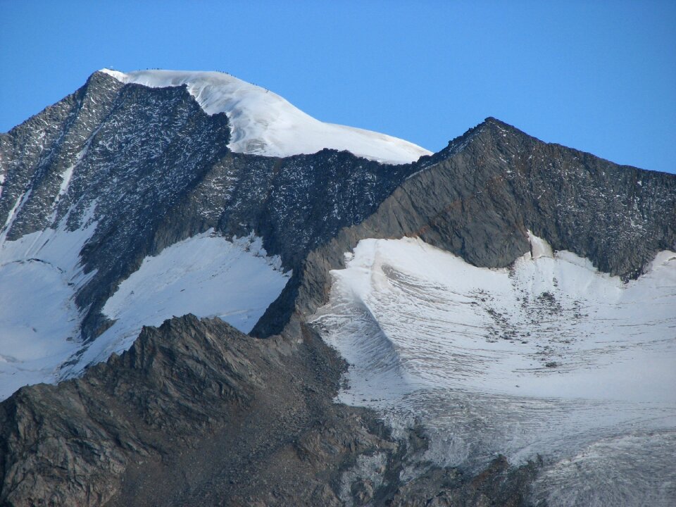 Summit cross roped people most mountain