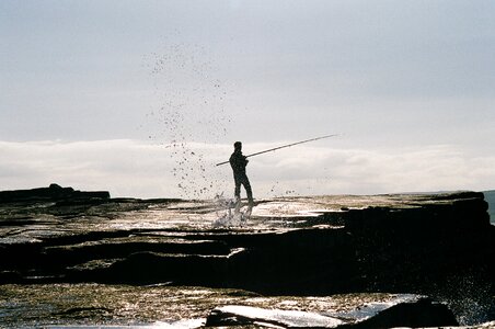 Fishing rod coast photo