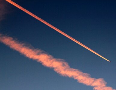 Aircraft contrail early morning photo