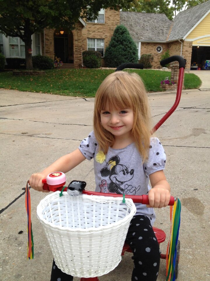Girl riding trike