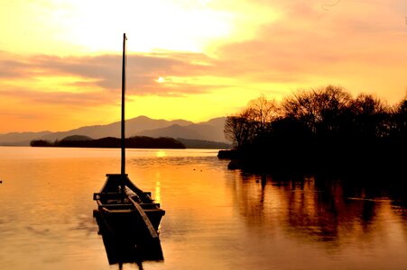 Lake boat sunset