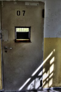 Prison cell prison wing iron door photo