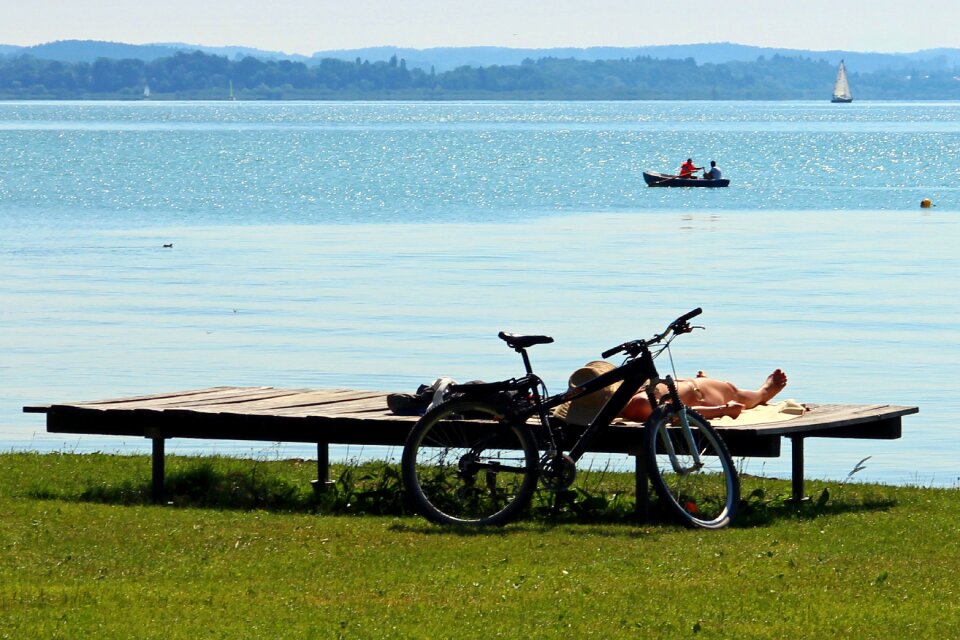 Sunbathing water beach photo