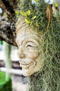 Mask sculpture stone figure photo