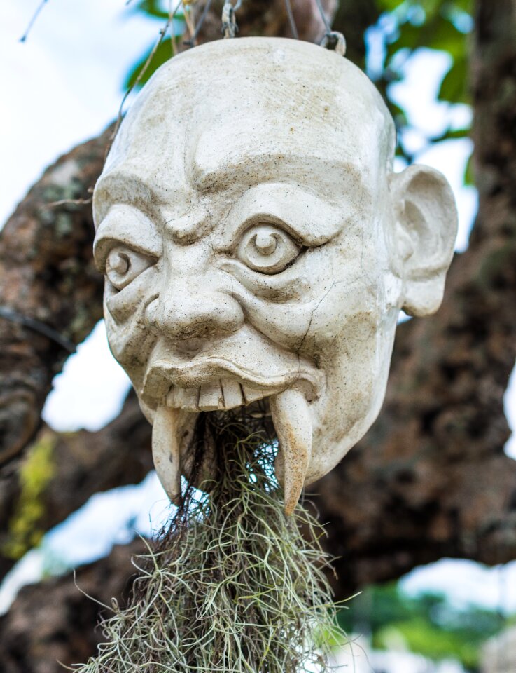 Mask sculpture stone figure
