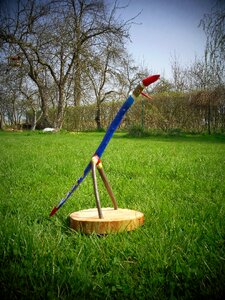 Folk art wooden bird sculpture