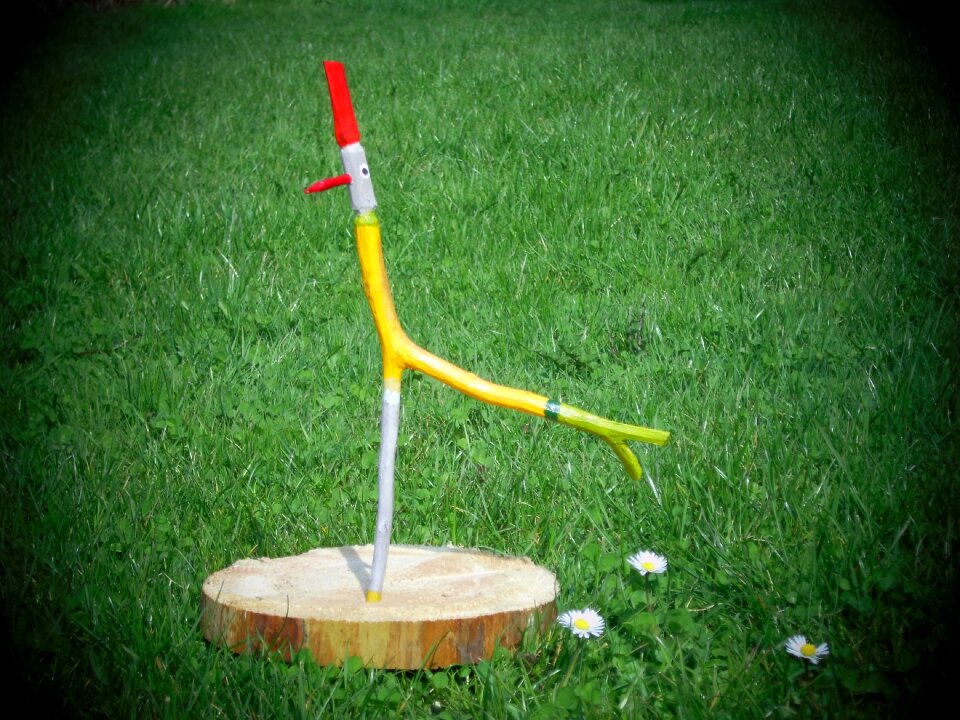 Folk art wooden bird sculpture
