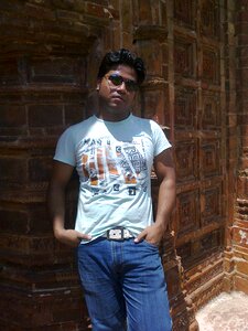 Standing sunglasses tourist