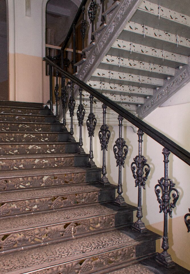 Wrought iron grab bars the descent