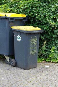 Yellow ton garbage can waste