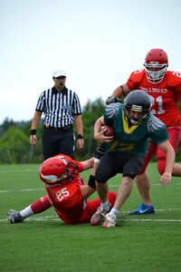 Courage helmet contact game photo