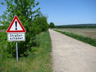 Road damage lane sign