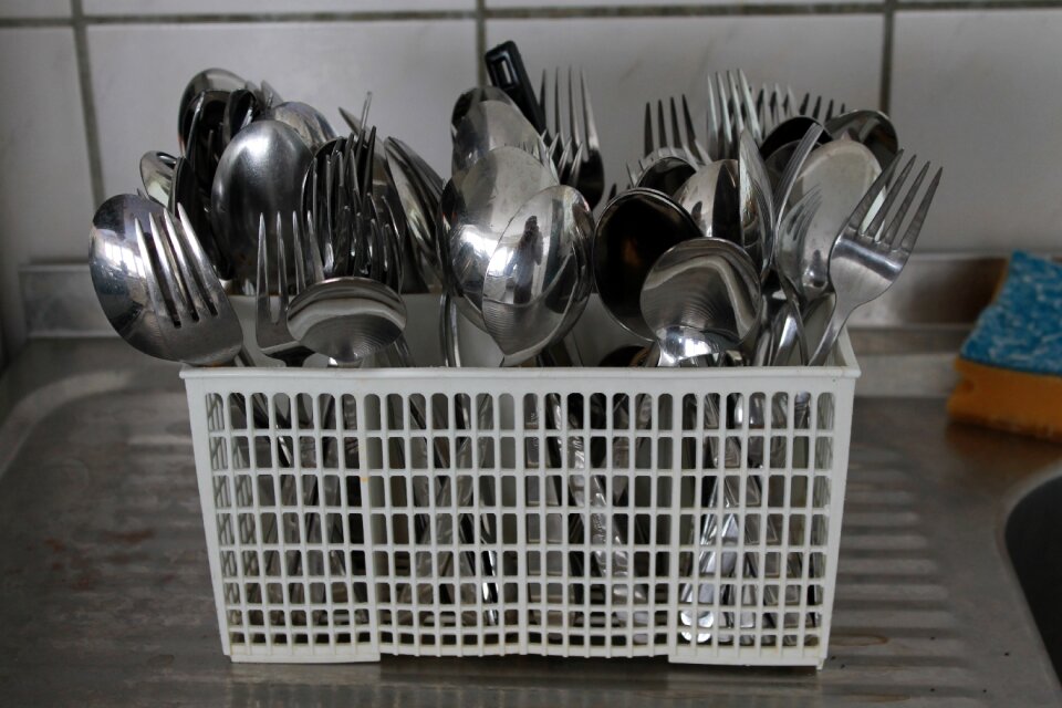 Spoon rinsed kitchen