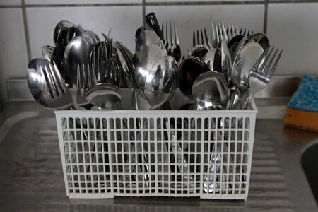 Spoon rinsed kitchen