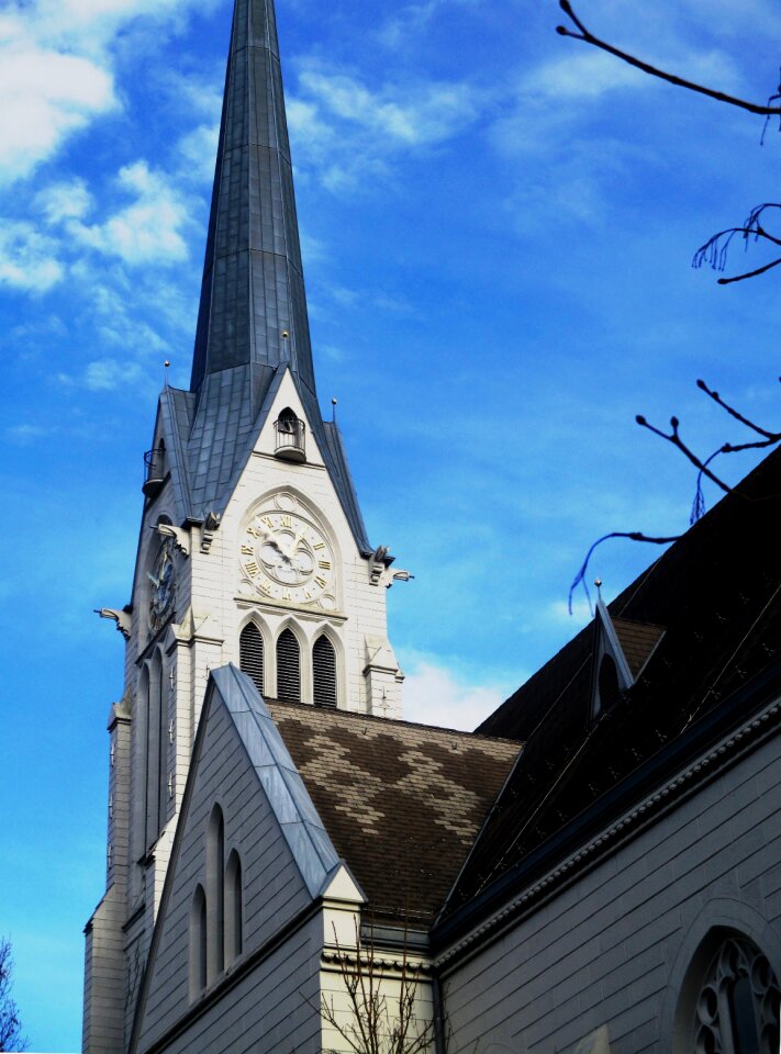 Steeple roof clock tower photo