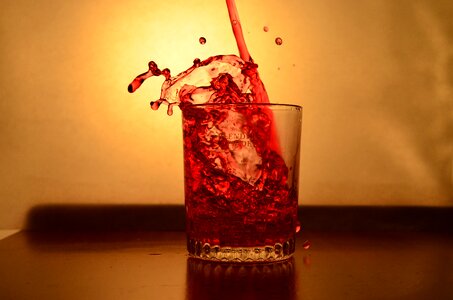 Red pouring alcohol