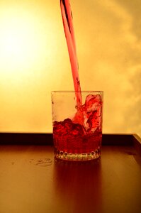Red pouring alcohol