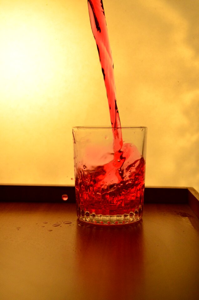 Red pouring alcohol