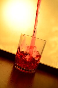 Red pouring alcohol