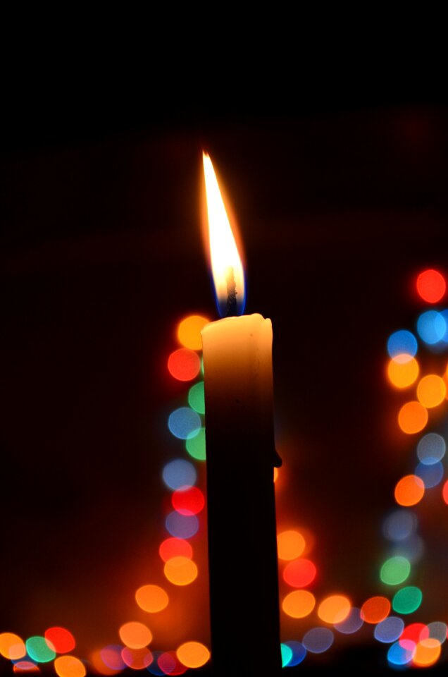 Lights blue wax candle