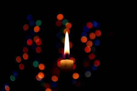 Lights blue wax candle