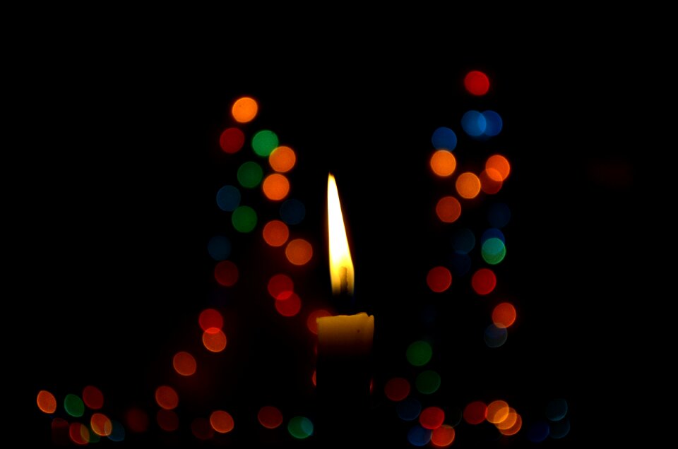 Lights blue wax candle