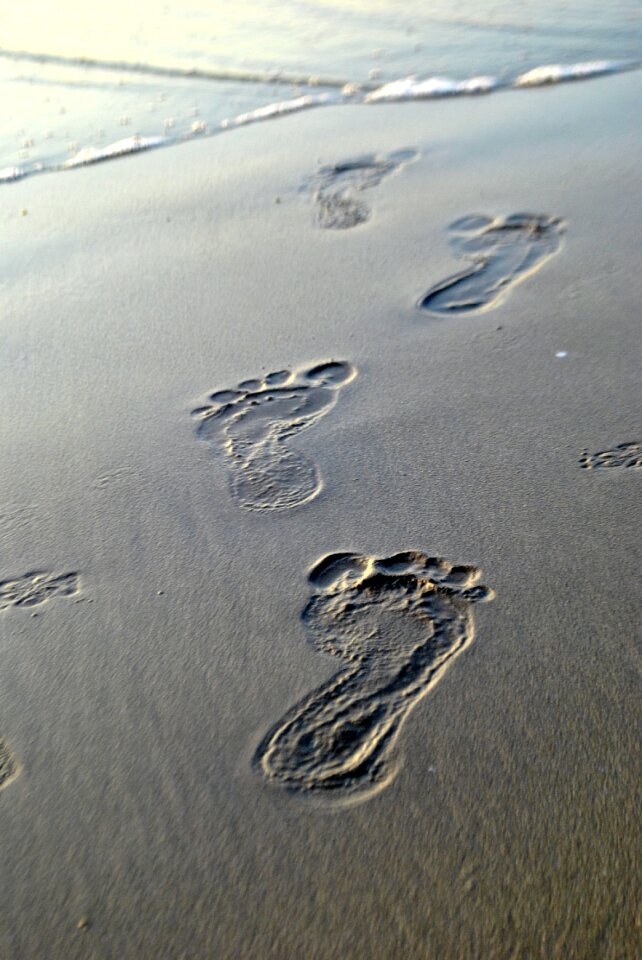 Barefoot footprint beach photo