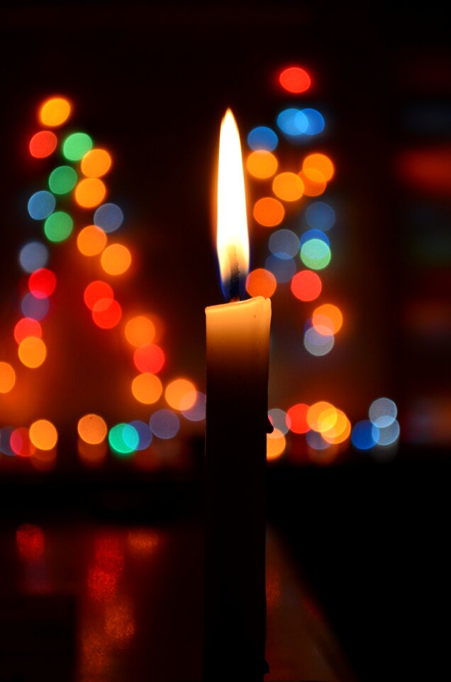 Lights blue wax candle