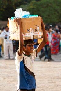 Boy head carry photo