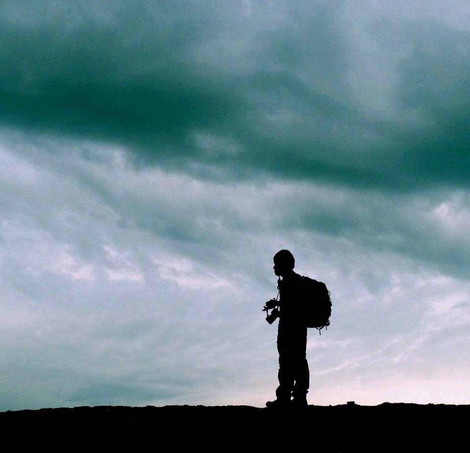 Backpacker clouds storm