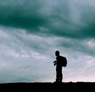 Backpacker clouds storm