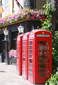Red england telephone booths photo