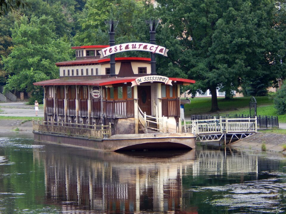 Boat the barge house on the water