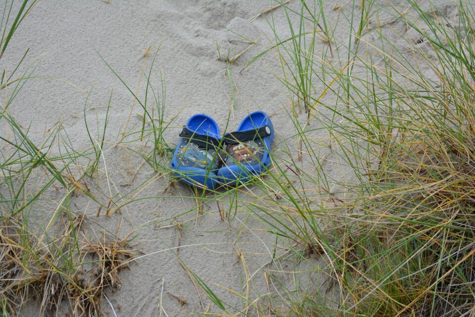 Shoes sand coast