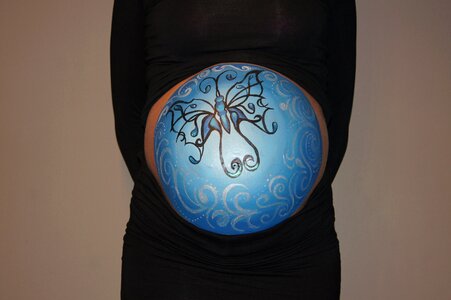 Pregnant blue bellypaint photo