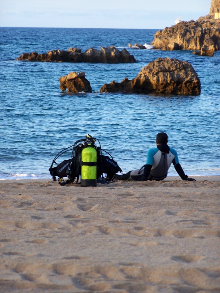 Divers sea beach